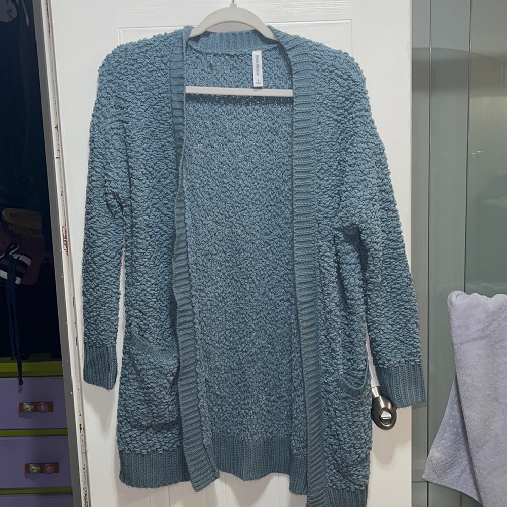 Zenana Premium cardigan in small a lovely blue with pockets. Soft and cozy.